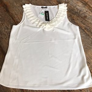 Sleeveless ivory blouse
